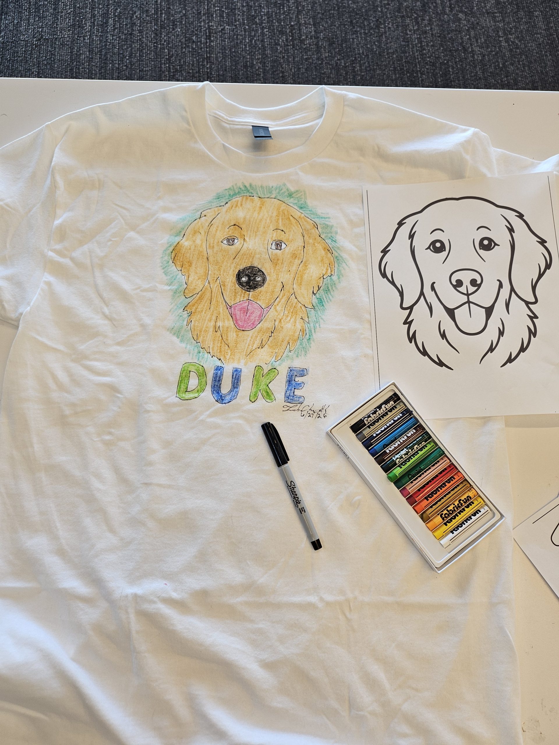 A dog portrait T-shirt with drawing template and textile art materials